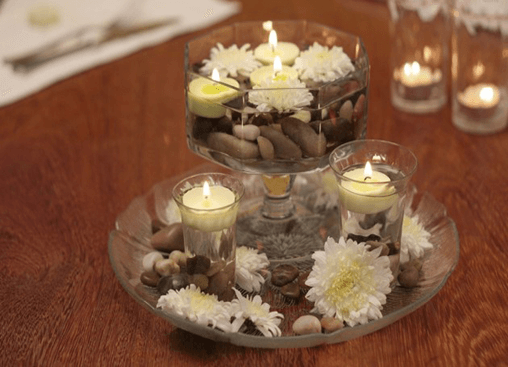 table decoration with flower and pebble