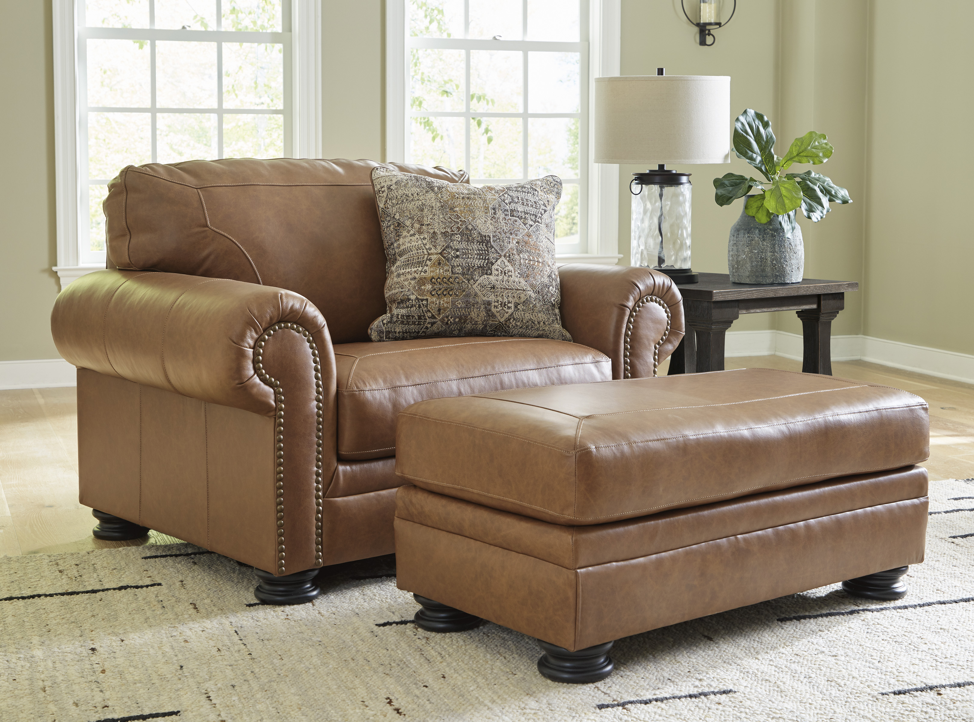 Ashley Furniture Carianna Caramel Chair And Ottoman Set