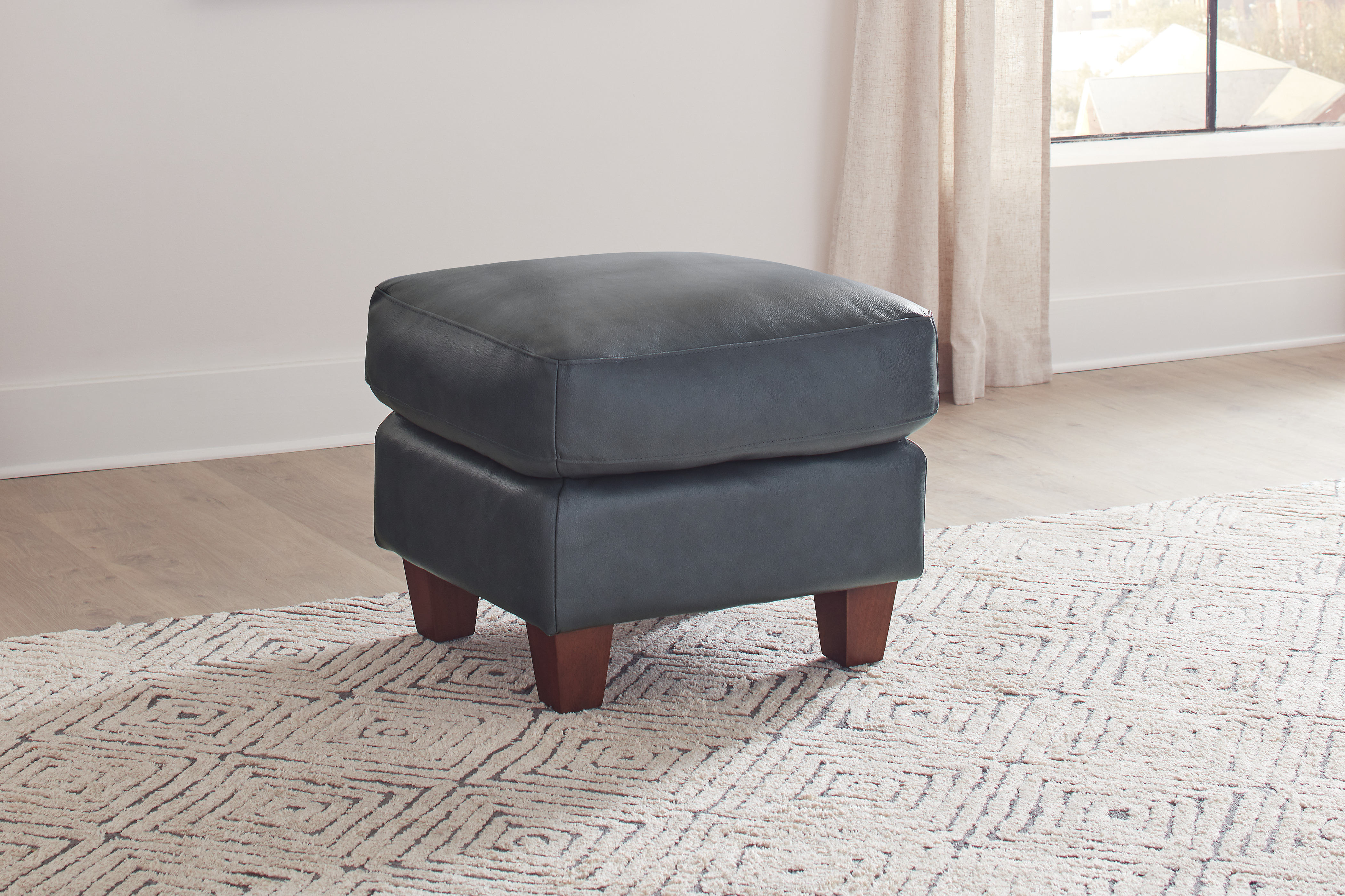 LIU-Traverse_Blue_Ottoman_Angle.jpg