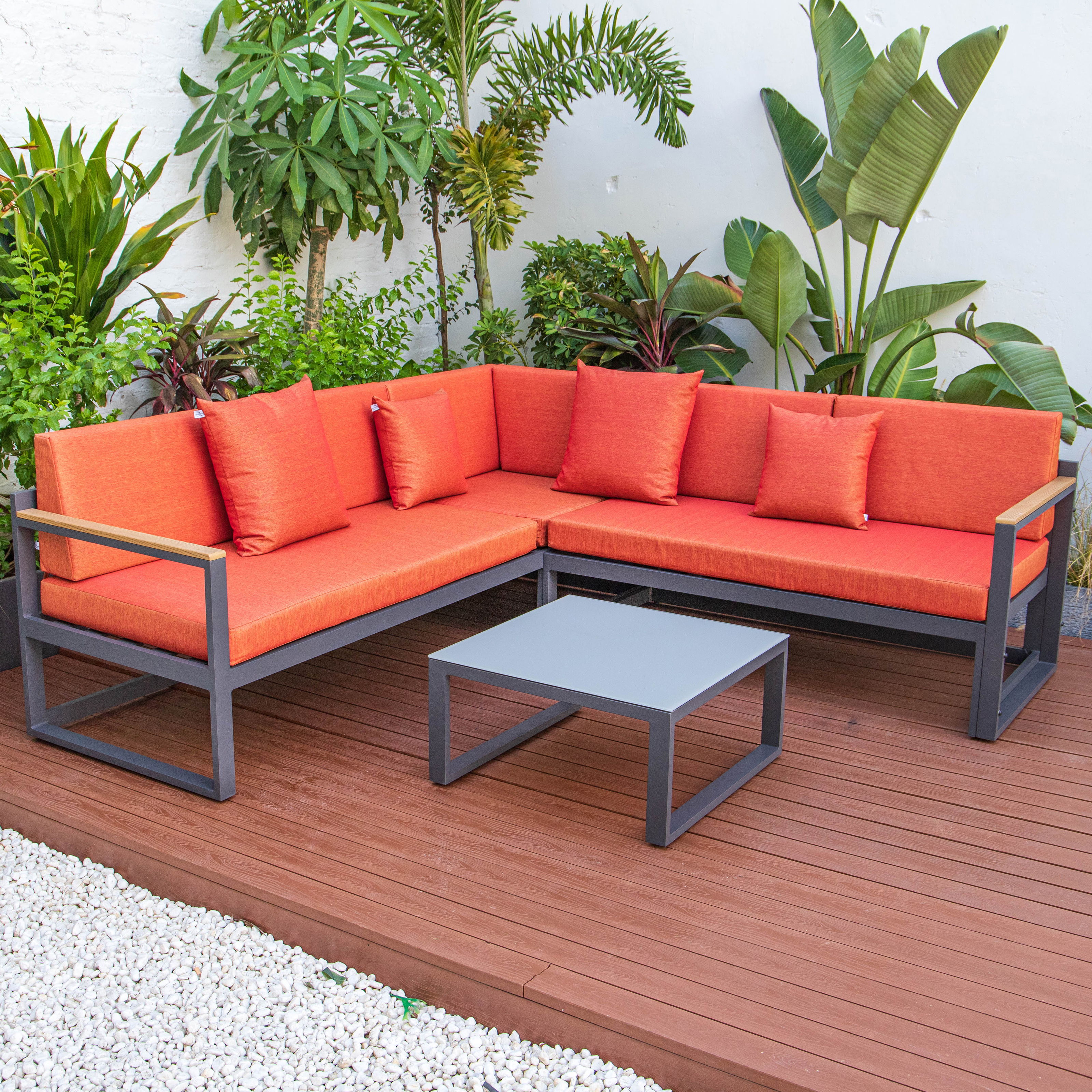 LeisureMod Chelsea Orange Fabric Black Adjustable Headrest Sectional with C...